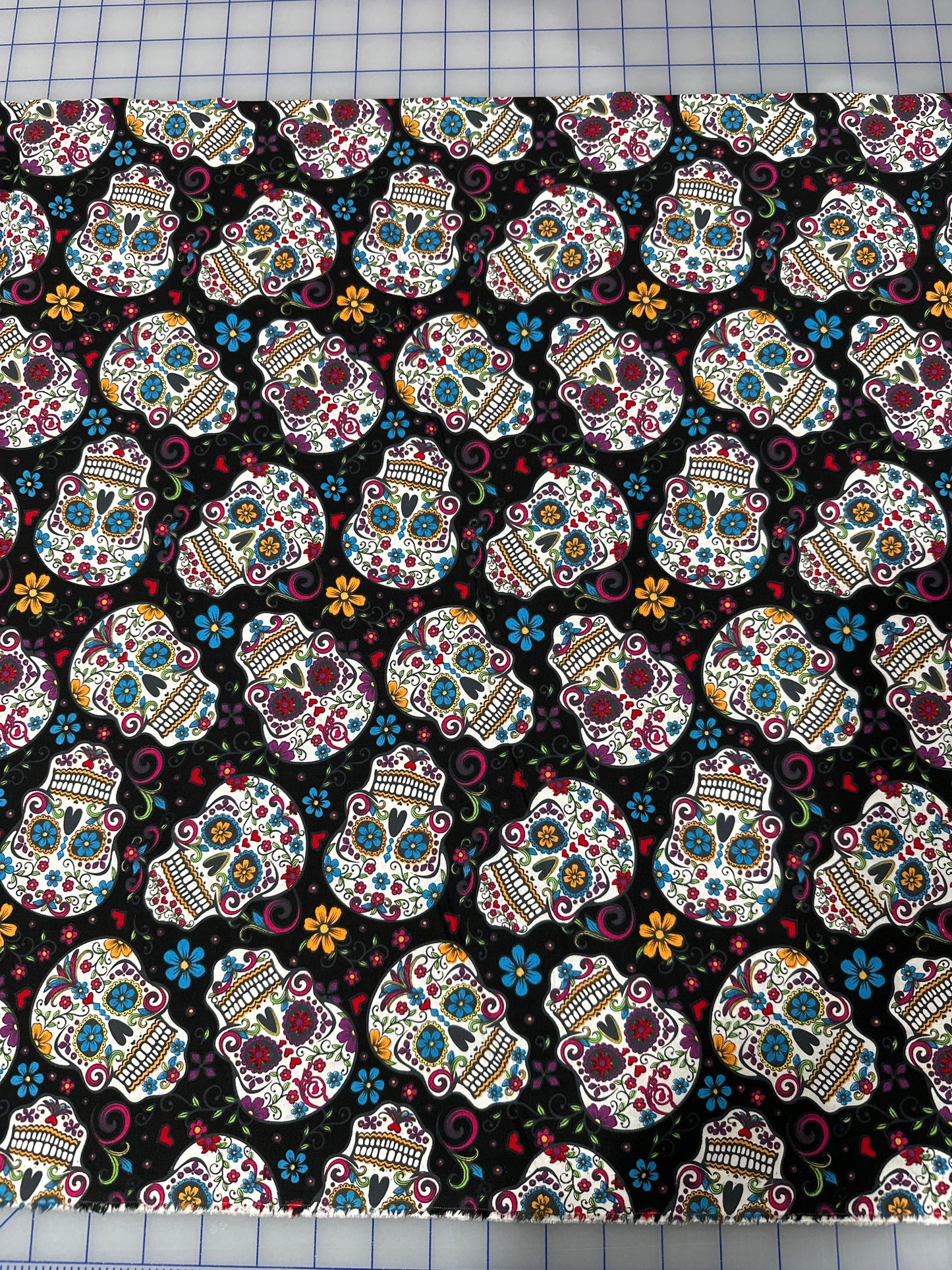 Folkloric Skulls in Black by David Textiles