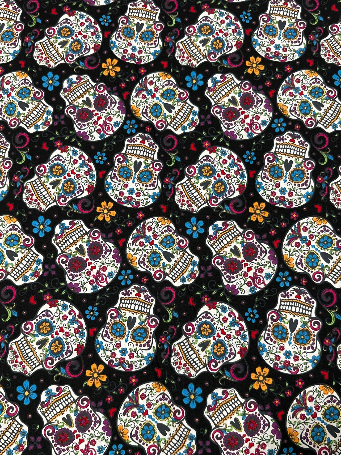 Folkloric Skulls in Black by David Textiles
